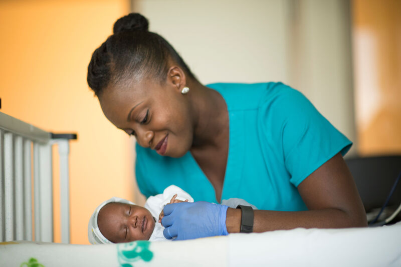 NICU nurse Nadia Fingal at a baby's bedside