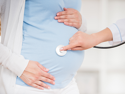 pregnant woman getting a checkup