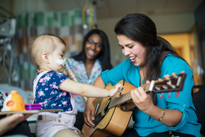 music therapist with a little girl