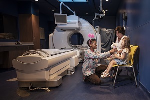 A patient awaits examination in the molecular imaging center