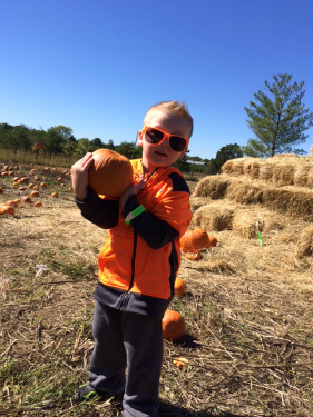 Jake holding pumpkin