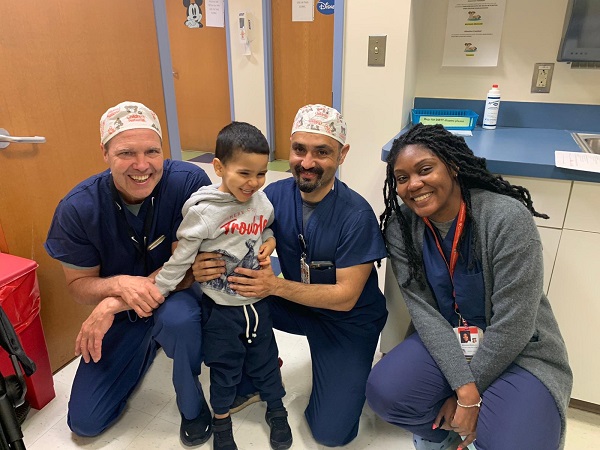 William with Drs. Kane and Petrosyan and another Children's National healthcare provider.
